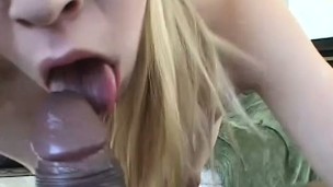 Wicked blonde girl shows her braces as she sucks an enormous rod