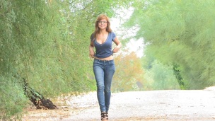Redhead chick in glasses and jeans love to flaunt her nice ass and natural tits in public