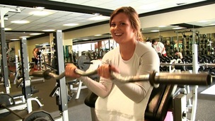 A stacked dilettante shows her tits while working out in the gym